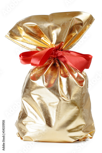 golden gift bag with a red bow