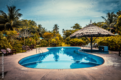 Tropical seaside hotel with swimming pool