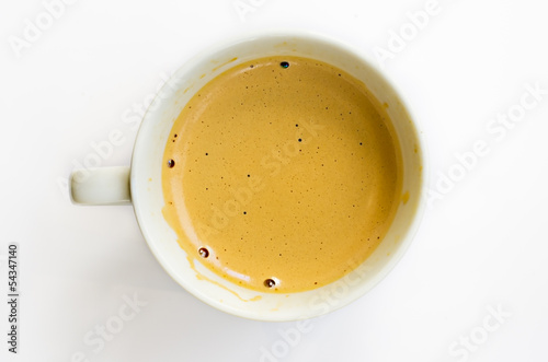 close up of coffee cup on white background