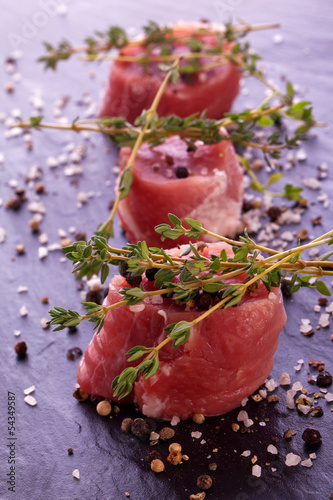 raw fresh filet with thyme salt and pepper