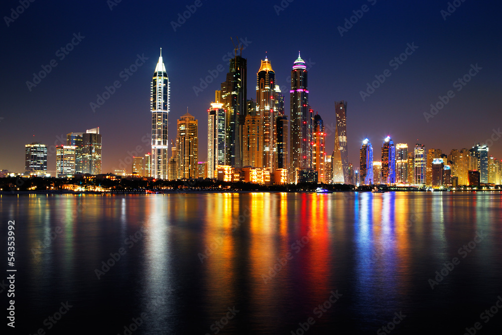 Naklejka premium Dubai Marina, UAE at dusk as seen from Palm Jumeirah
