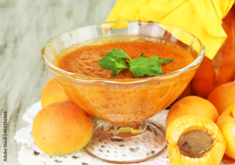 Apricot jam in glass jar and fresh apricots, Apricot jam in glass jar and fresh apricots,