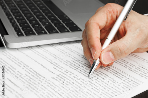 Signing Contract with Laptop