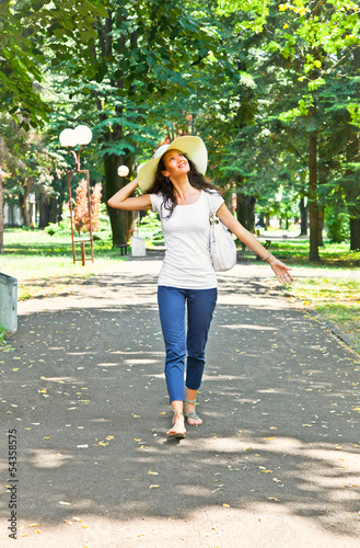 Beautiful young woman walking in park, Serbia. © Aleksandar Todorovic