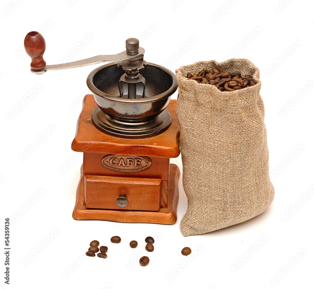 Coffee beans sack with wooden coffee grinder isolated on white b Coffee beans sack with wooden coffee grinder isolated on white b