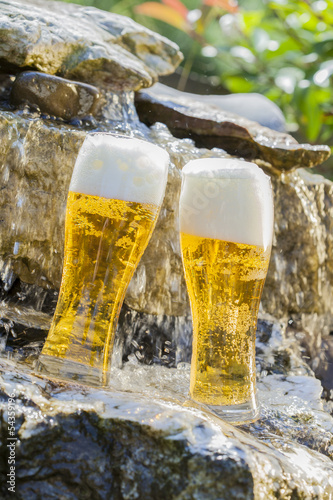 german beer cooled in waterfall