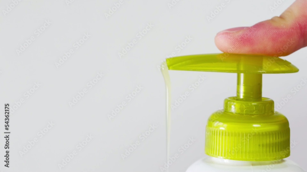 Pushing container with a liquid soap. Pushing container with a liquid soap.