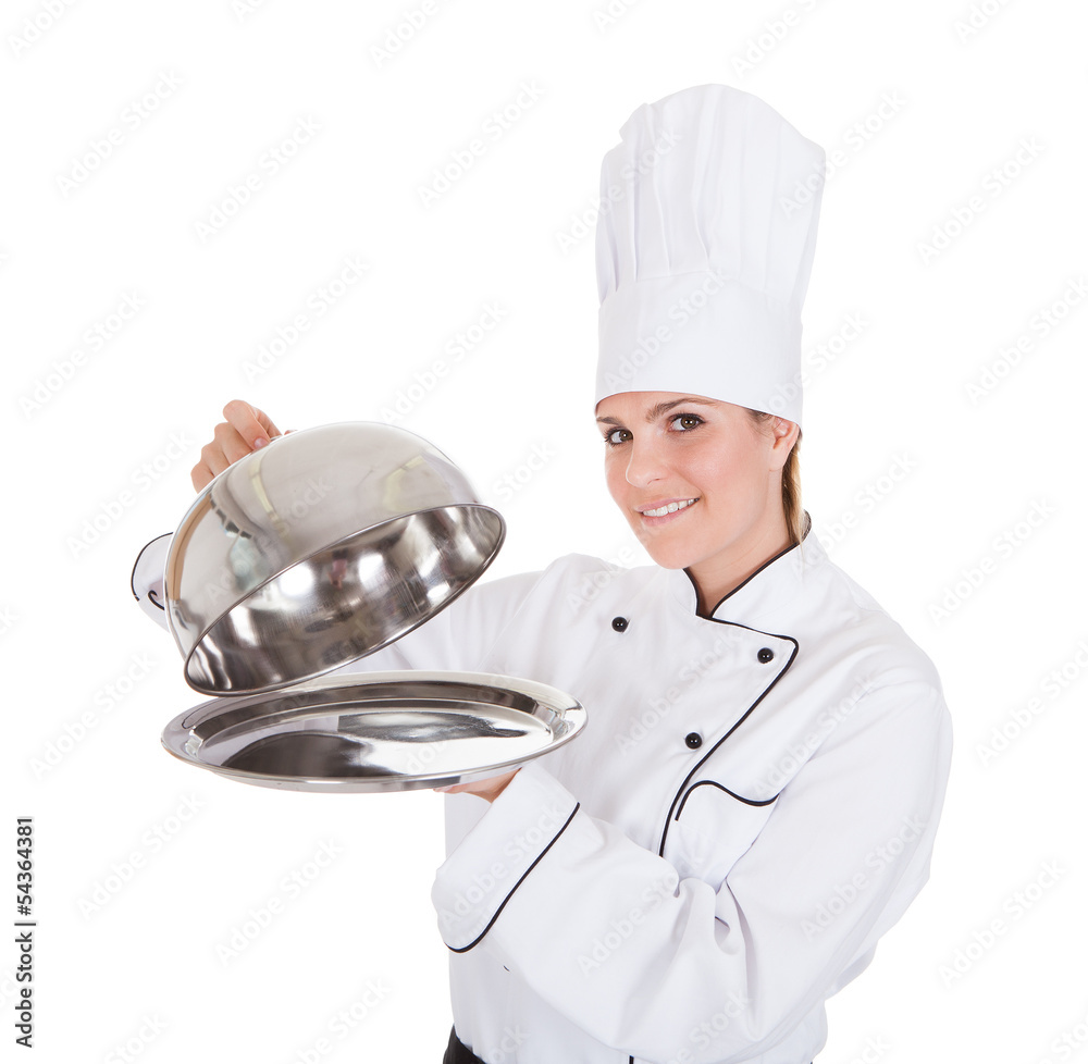 Portrait Of Female Chef Holding Tray Portrait Of Female Chef Holding Tray