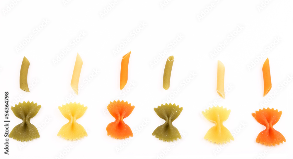Fototapeta premium Composition of different pasta in three colors.