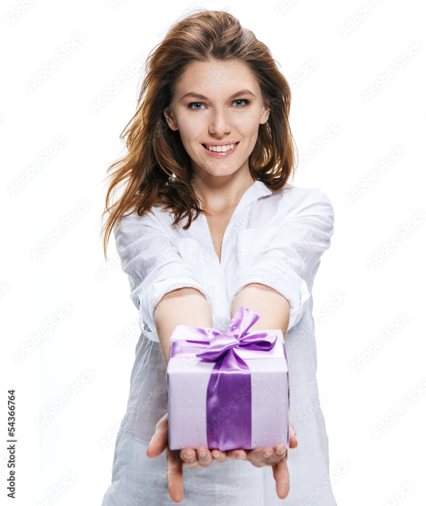Young beautiful woman gives gift in box isolated Young beautiful woman gives gift in box isolated