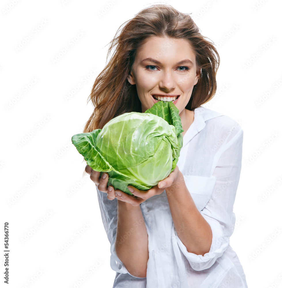 Young beautiful woman with cabbagehead in hand Young beautiful woman with cabbagehead in hand