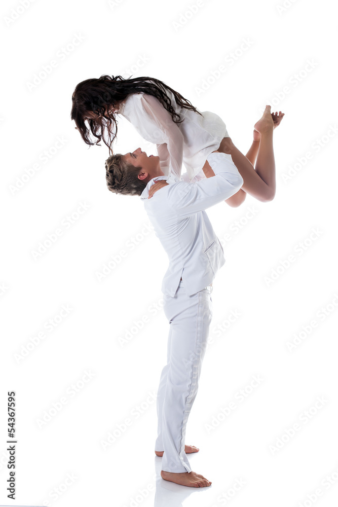 Image of emotional young couple dancing in studio Image of emotional young couple dancing in studio