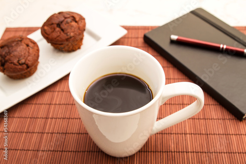 Chocolate Muffins with a cup of coffee
