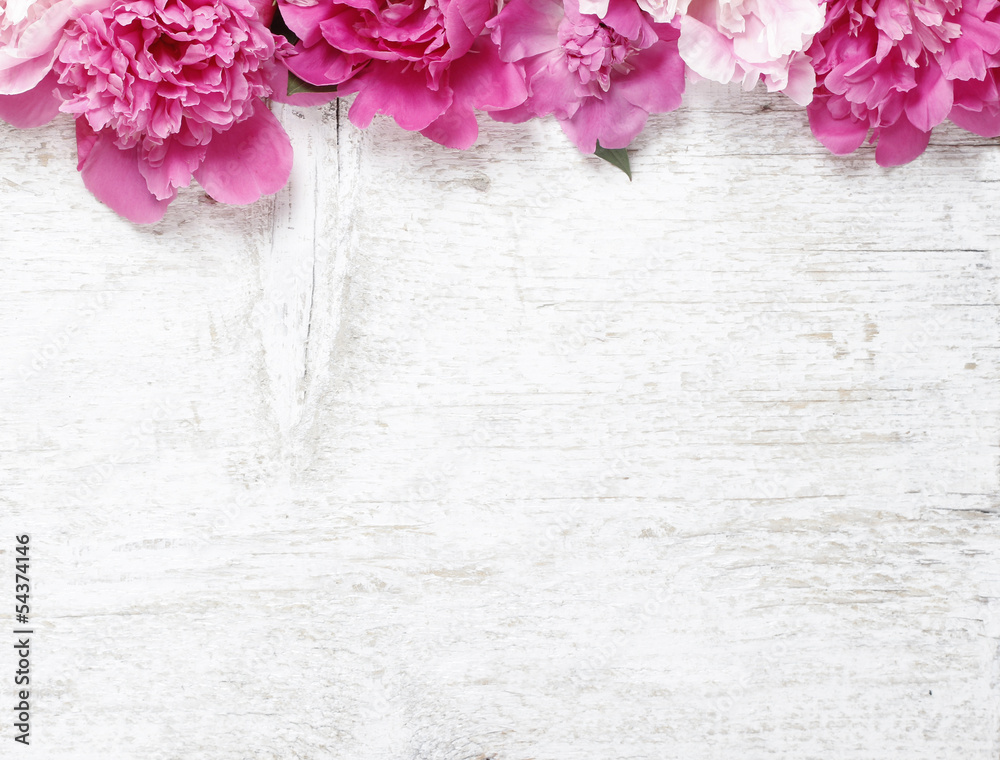 Stunning peonies on wooden background. Copy space Stunning peonies on wooden background. Copy space