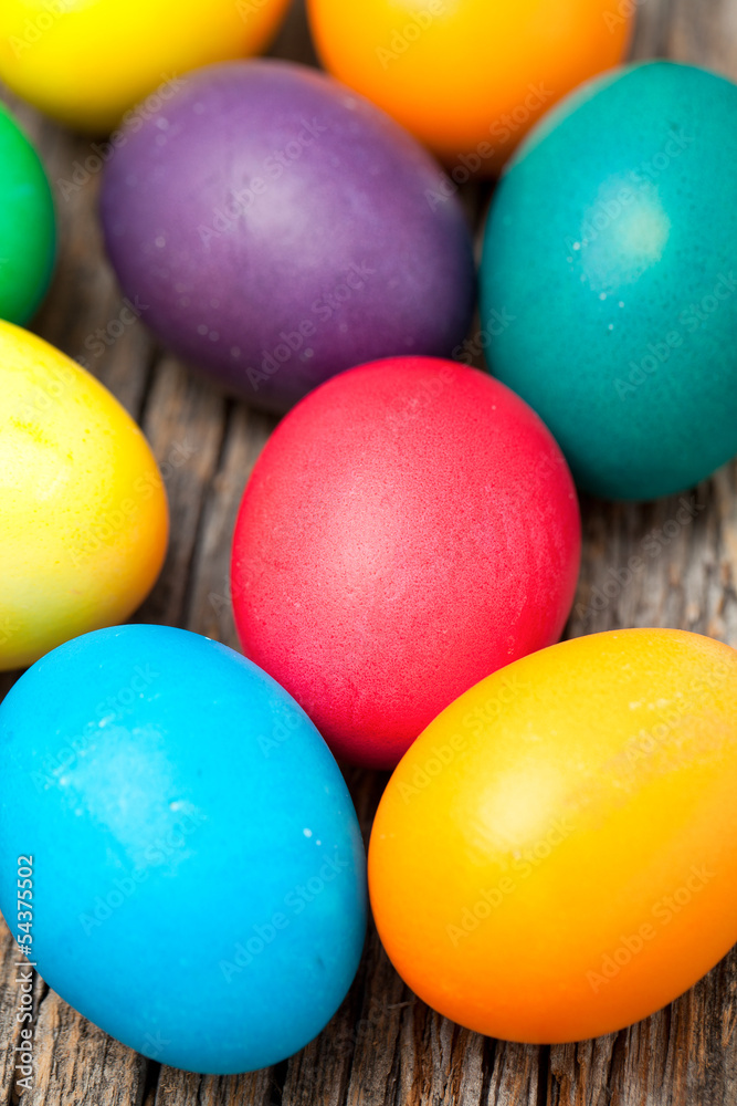 Easter eggs on wooden surface Easter eggs on wooden surface
