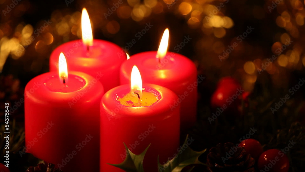 Close up of four burning candles Close up of four burning candles