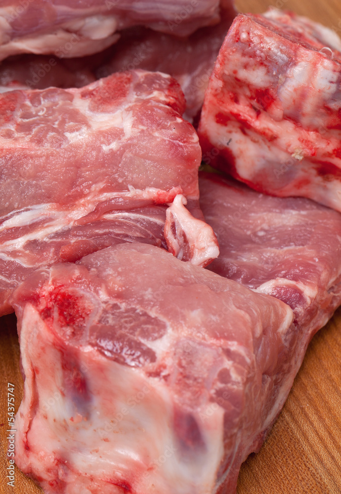 pork ribs on wooden surface pork ribs on wooden surface