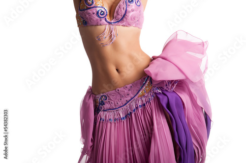 Bild auf Leinwand Bellydancer with Pink Costume Shaking Her Hips