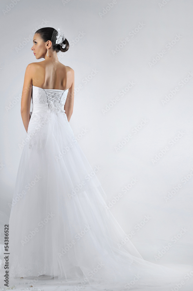 Beautiful bride in a luxurious wedding dress Beautiful bride in a luxurious wedding dress