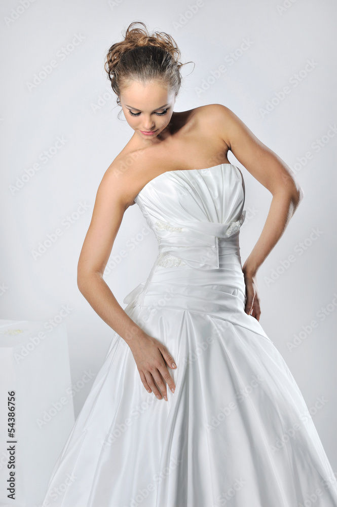 Beautiful bride in a luxurious wedding dress Beautiful bride in a luxurious wedding dress