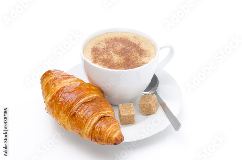 fresh croissant and cup of cappuccino with brown sugar isolated