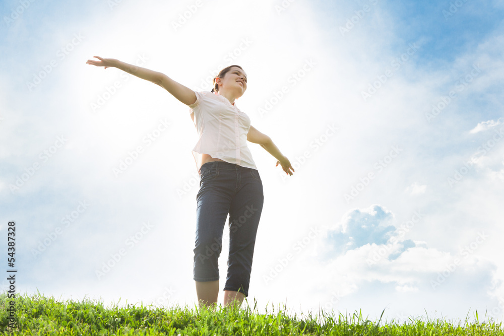 Young Woman With Her Arms Outstretched Young Woman With Her Arms Outstretched
