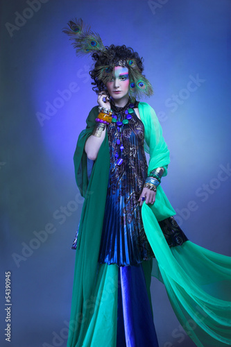 Woman in peacock image. © Alex Azarov