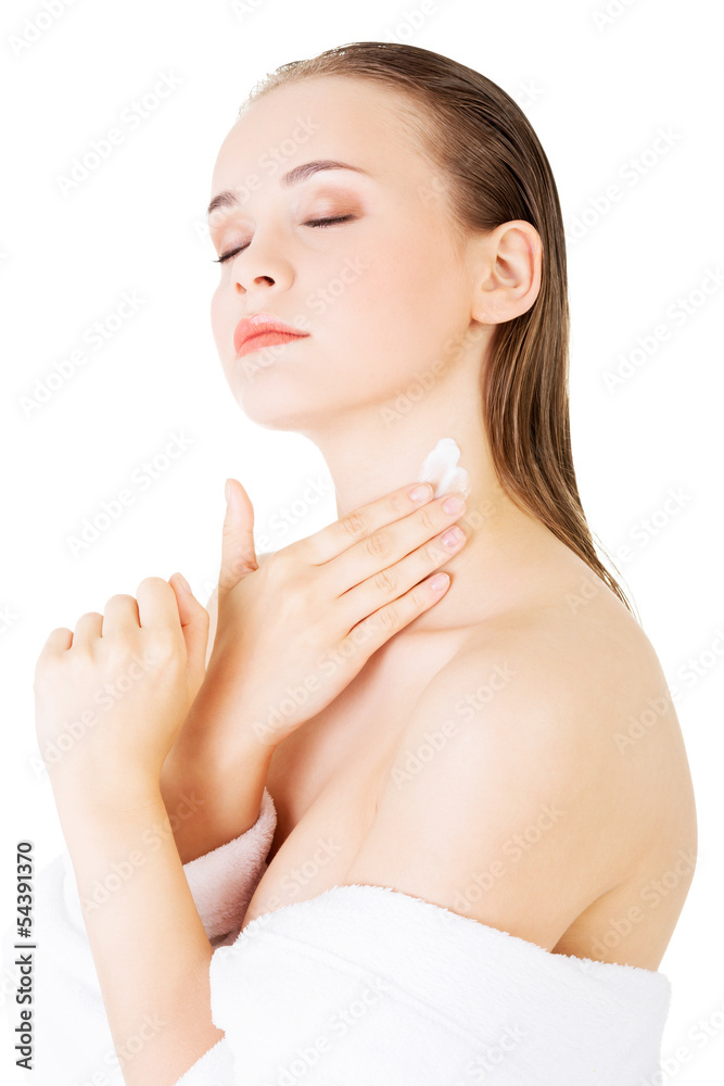 Beautiful woman with healthy skin applying cosmetic cream Beautiful woman with healthy skin applying cosmetic cream