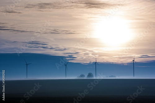 Sunrise with wind turbines