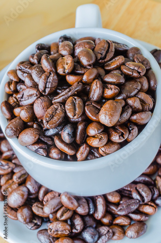 Coffee beans on cup