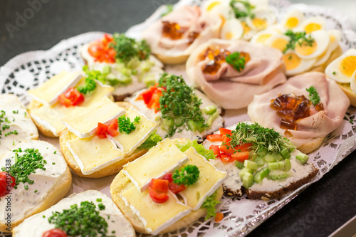 Sandwiches with cold cuts on a tray