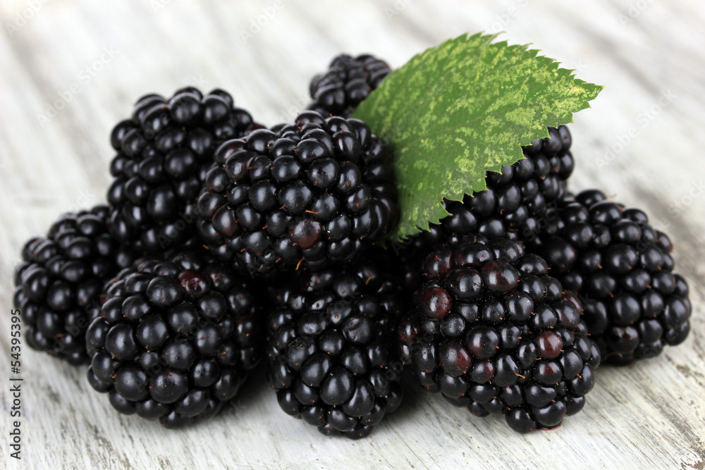 Sweet blackberries on table close-up Sweet blackberries on table close-up