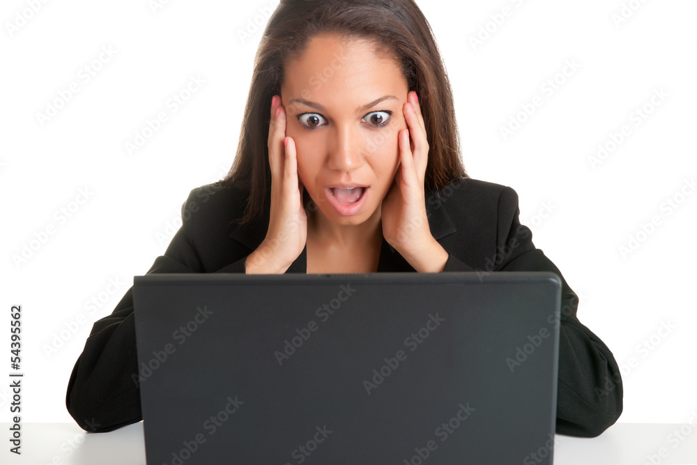 Woman in Panic Looking At A Computer Monitor Woman in Panic Looking At A Computer Monitor
