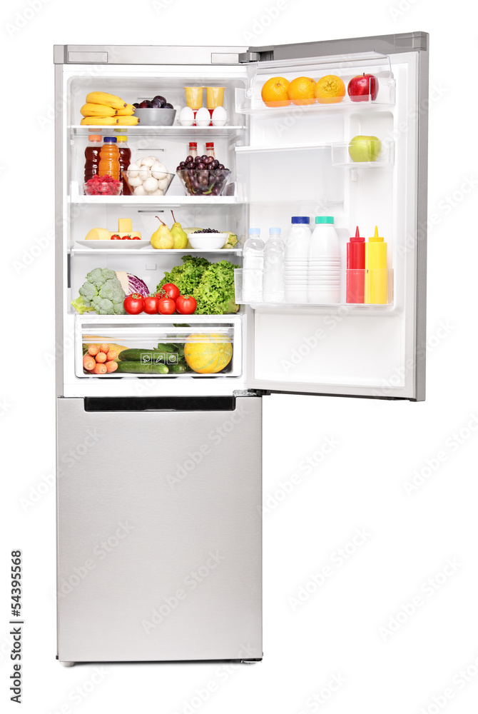 Studio shot of an open fridge full of healthy food products Studio shot of an open fridge full of healthy food products