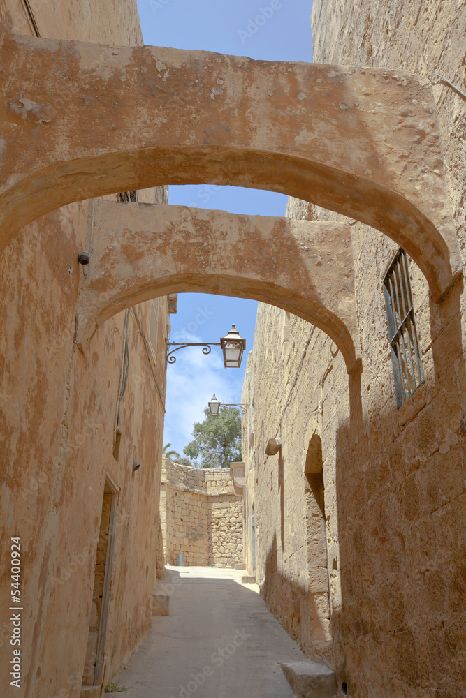 Old narrow street in Victoria on the island of Gozo, Malta.