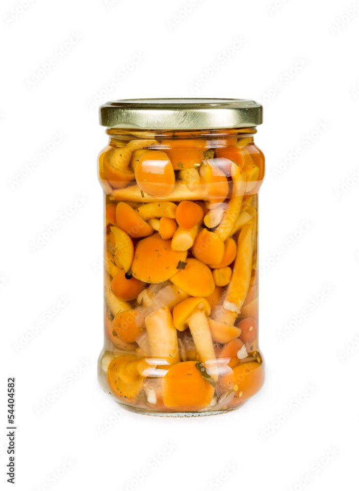 Marinated mushrooms in the glass jar Marinated mushrooms in the glass jar