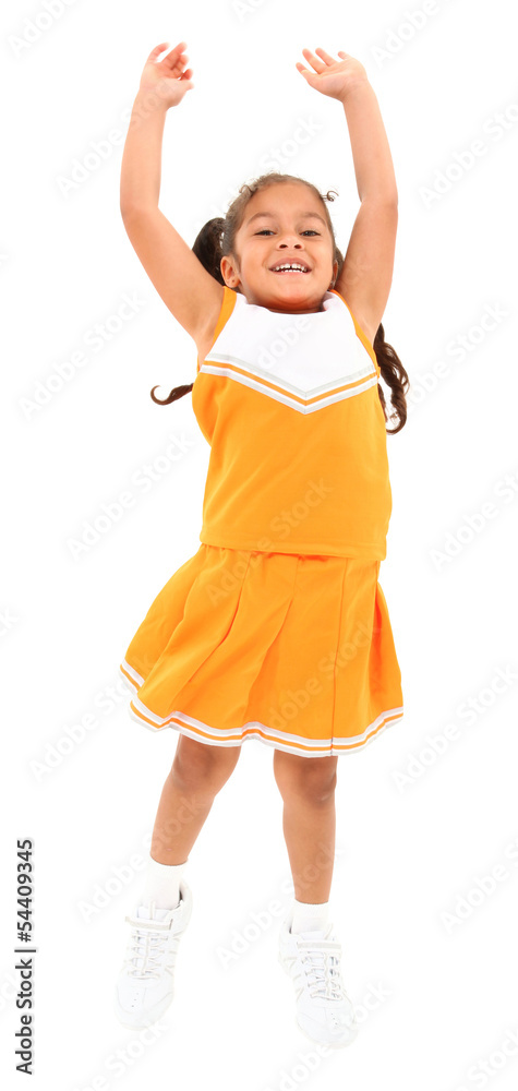 Beautiful hispanic cheer leader in uniform jumping over white ba Beautiful hispanic cheer leader in uniform jumping over white ba