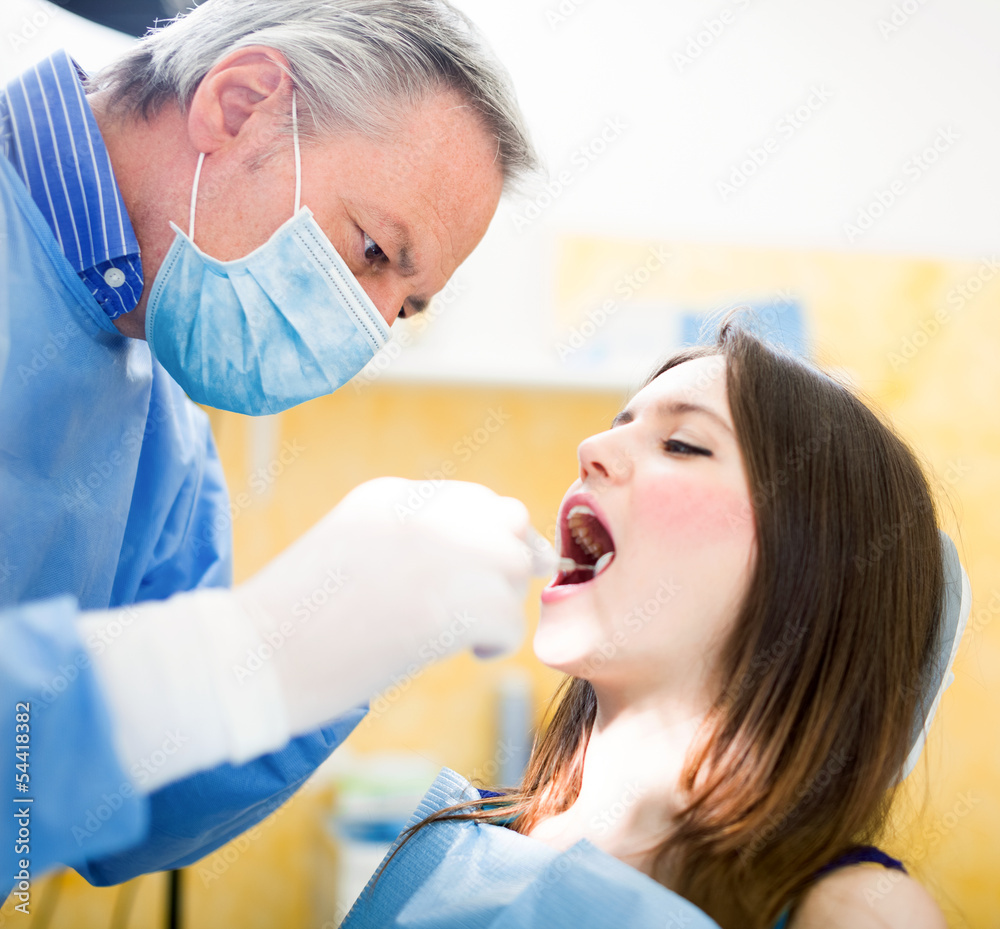 Dentist at work Dentist at work