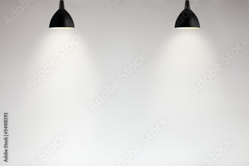Lamps on a white wall