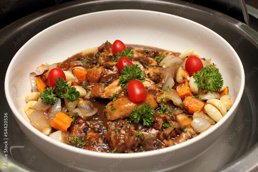 Chicken pieces stewed with vegetables Chicken pieces stewed with vegetables