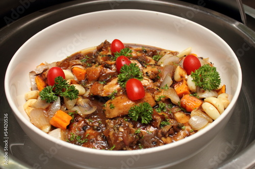 Chicken pieces stewed with vegetables