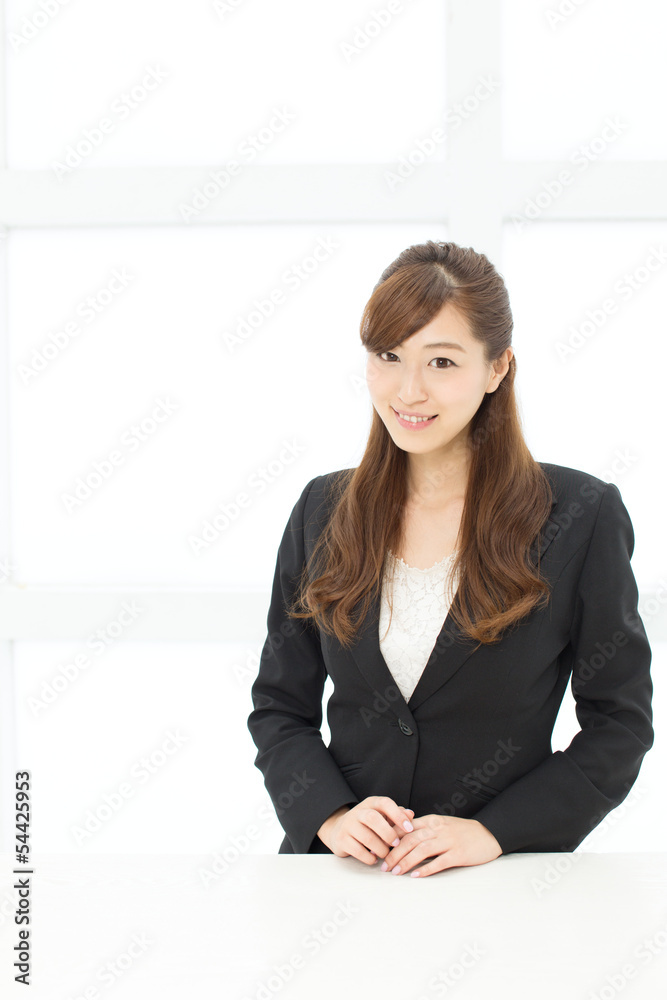 Beautiful young businesswoman working in office Beautiful young businesswoman working in office