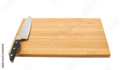 Steel kitchen knife on cutting board
