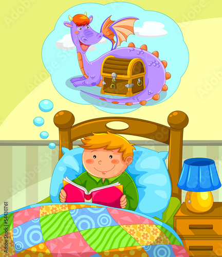 boy in bed reading a book about dragons