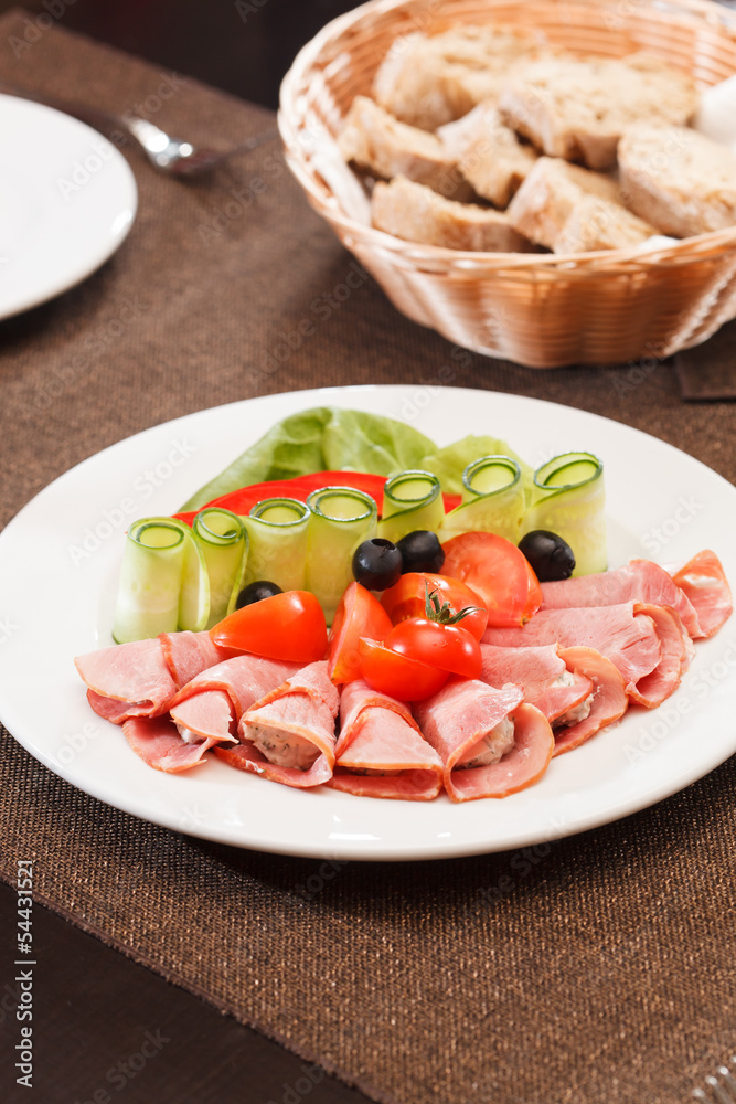 Meat appetizer with vegetables