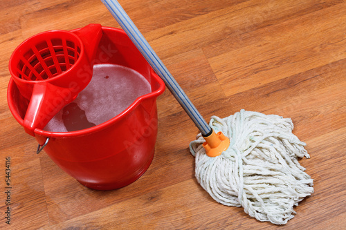 cleaning of floors by mop