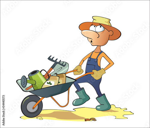 A man carries garden tools in a wheelbarrow