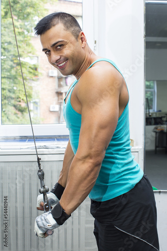 Young man training in the gym