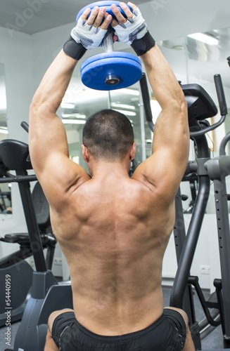 Young man training in the gym