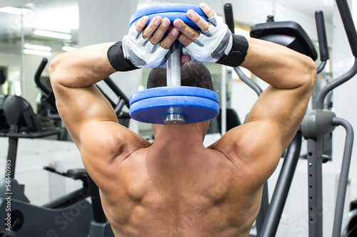 Young man training in the gym